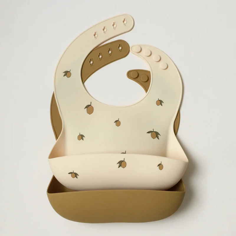 Konges Sløjd 2-pak silicone hagesmæk, lemon/almond