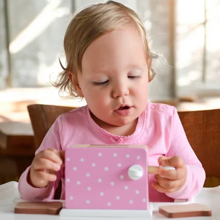 Holztoaster mit Punkten, rosa