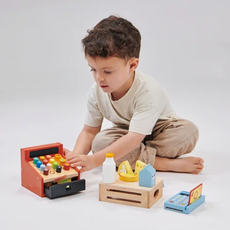 Mentari, Kassenapparat mit Geld