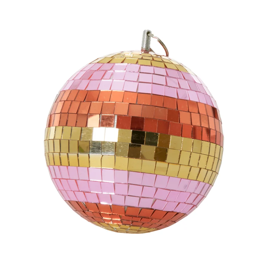 Rice mellem discokugle, pink og guld