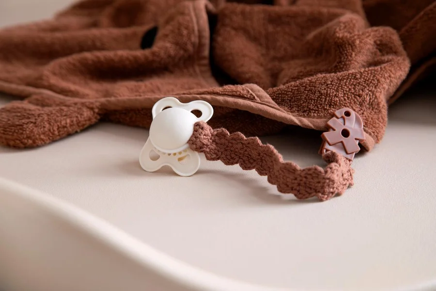 Sebra hæklet suttekæde, dark amber