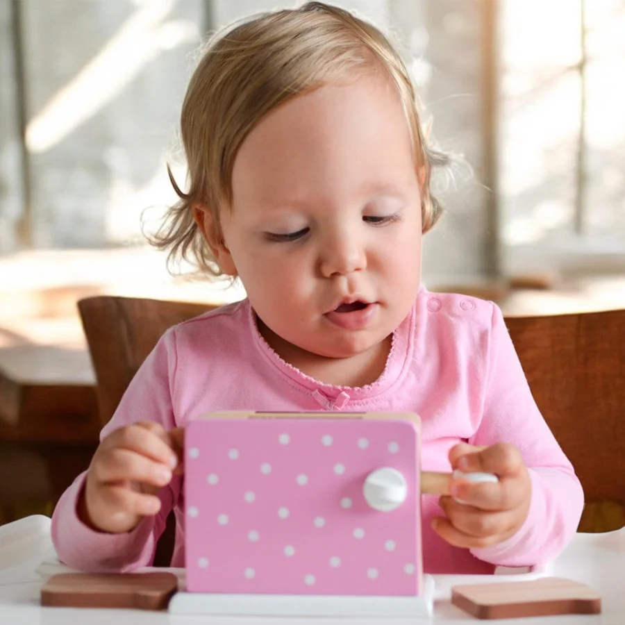 Toaster i træ med prikker, lyserød